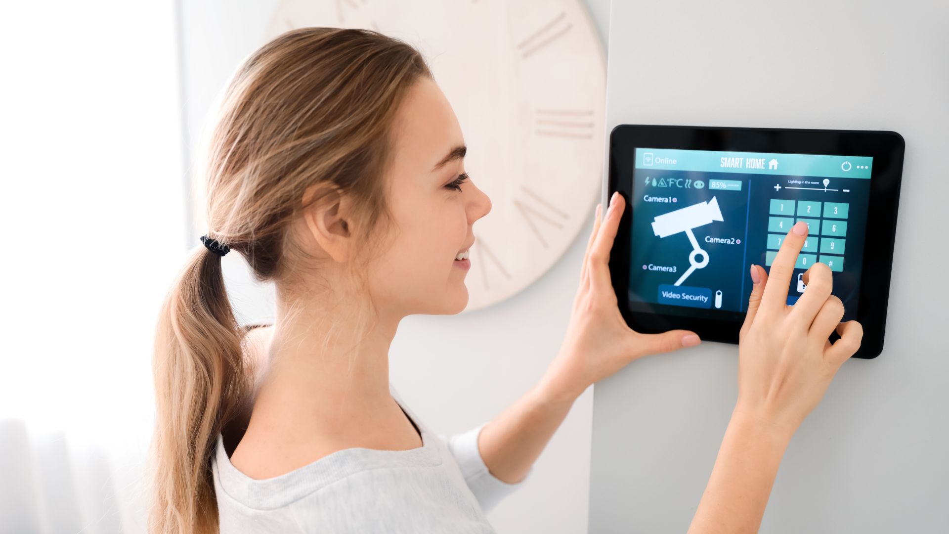 A woman using a home security system